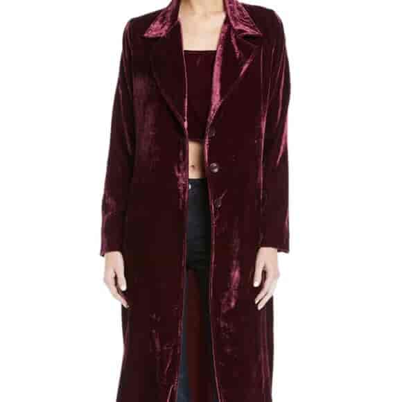 Velvet long coat dry cleaning and alterations by Quality Dry Cleaners
